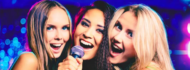 Guests singing together on a karaoke rental system in NYC